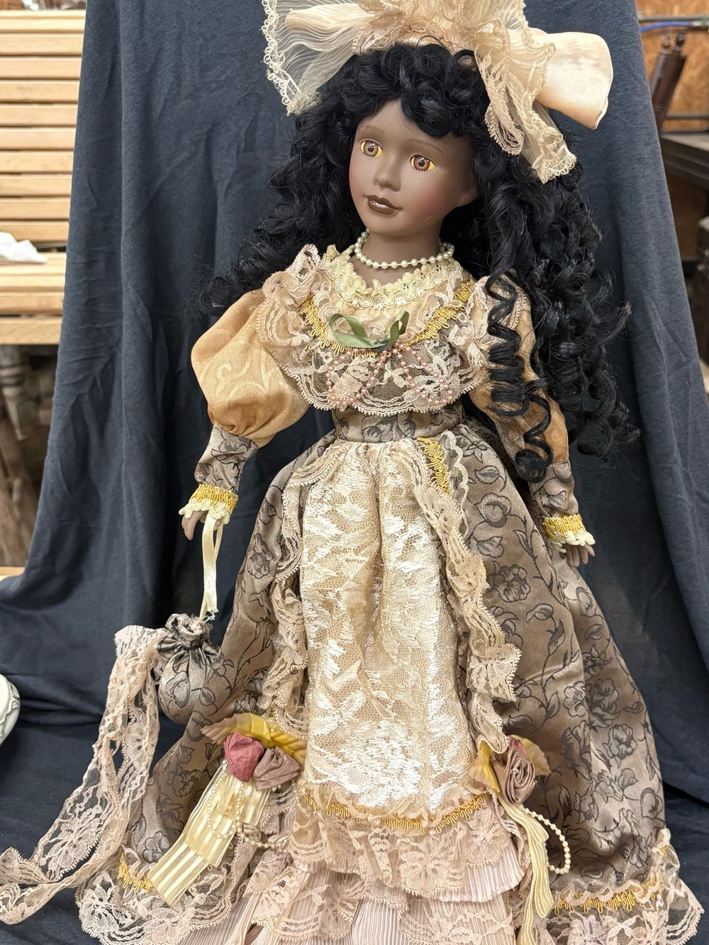 Victorian-Style Porcelain Doll in Beige and Brown Dress